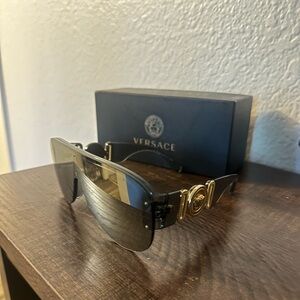 Versace Black and Gold Sunglasses with Luxurious Accents